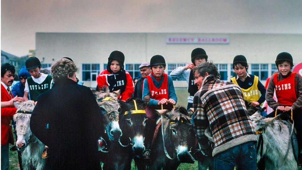 Children on donkeys