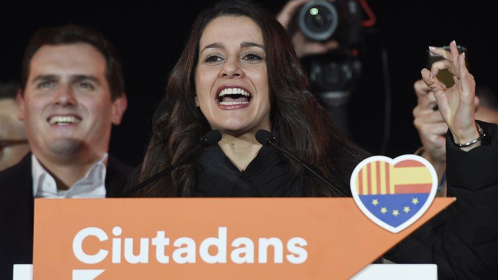 Centre-right party Ciudadanos (Citizens) candidate Inés Arrimadas and party leader Albert Rivera celebrate in Barcelona on December 21, 2017