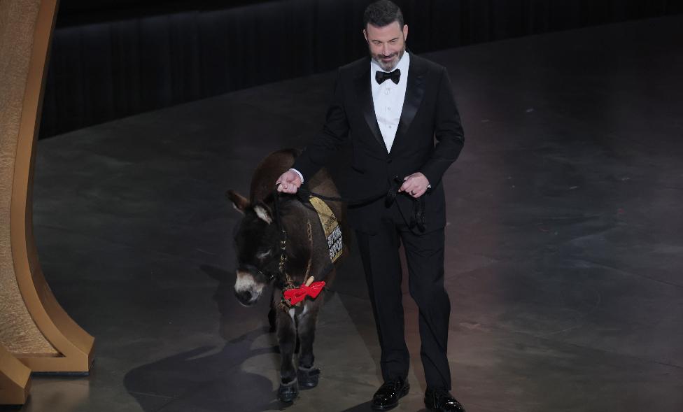 Host Jimmy Kimmel brings out a donkey during the Oscars show at the 95th Academy Awards in Hollywood, Los Angeles, California, U.S., March 12, 2023