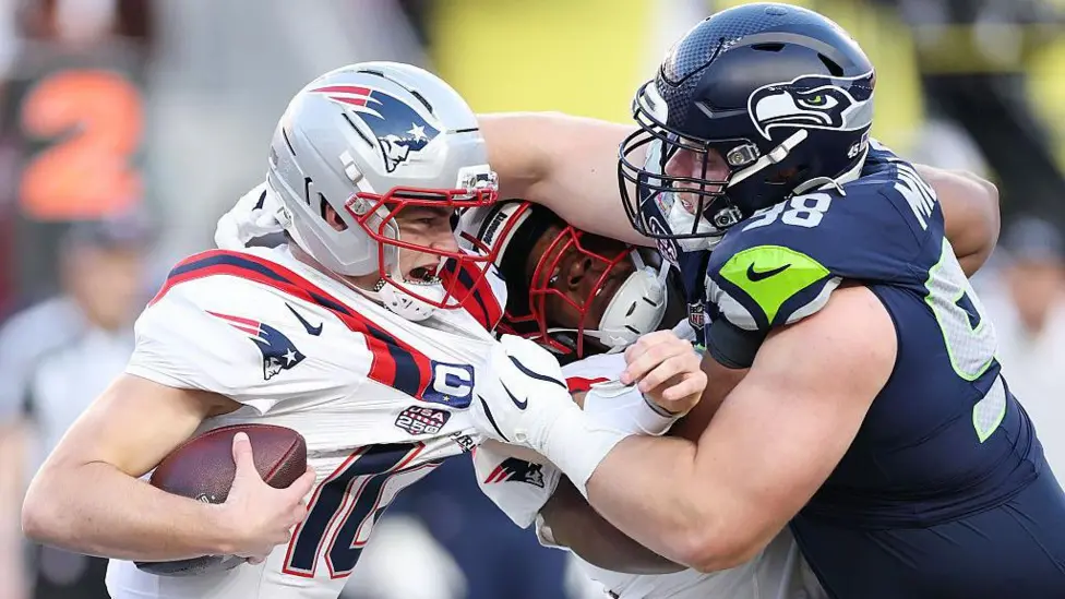 Drake Maye is sacked