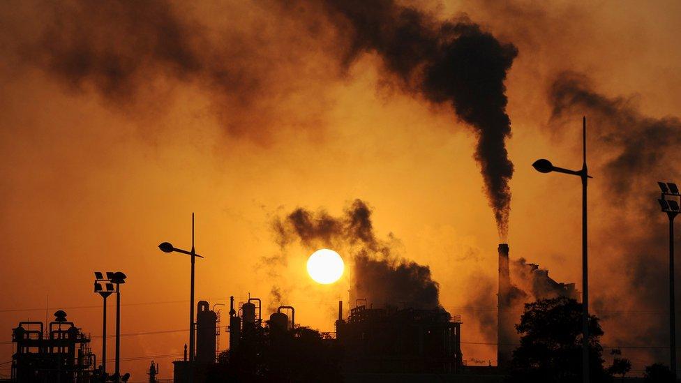 Smoke billows from chimneys at a chemical factory in Hefei, Anhui province, in this March 10, 2010 file photo