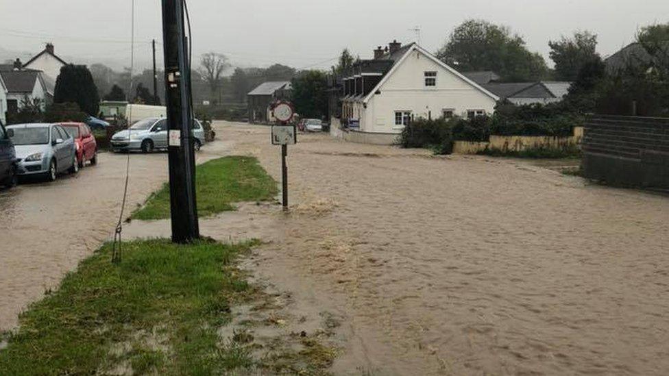 Flood water runs through Talysarn, near Lampeter