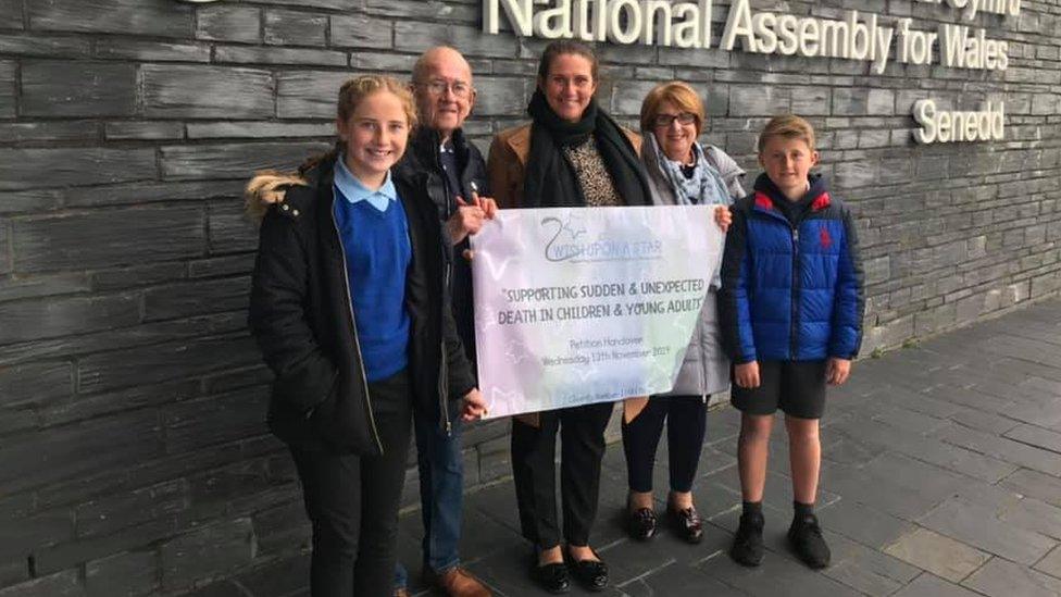 Rhian Mannings MBE handing over the petition to the Senedd in November 2019