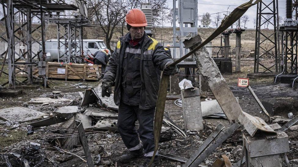 Worker repairs infrastructure in a power station in Ukraine that was damaged by a Russian air attack.