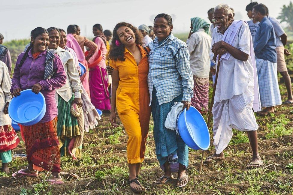 Sana Javeri Khadri and farm workers in India