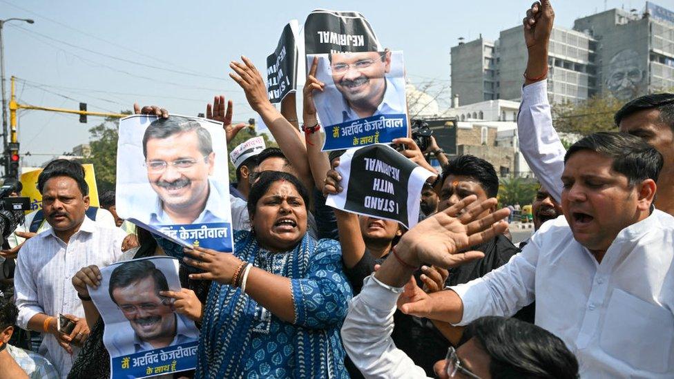 Supporters of Aam Aadmi Party (AAP) protest against the arrest of AAP leader and Delhi's Chief Minister Arvind Kejriwal, in New Delhi on March 22, 2024. Arvind Kejriwal, chief minister of the capital Delhi and a key leader in an opposition alliance formed to compete against Modi in the polls, was detained on March 21 in connection with a long-running corruption probe. (Photo by Arun SANKAR / AFP) (Photo by ARUN SANKAR/AFP via Getty Images)