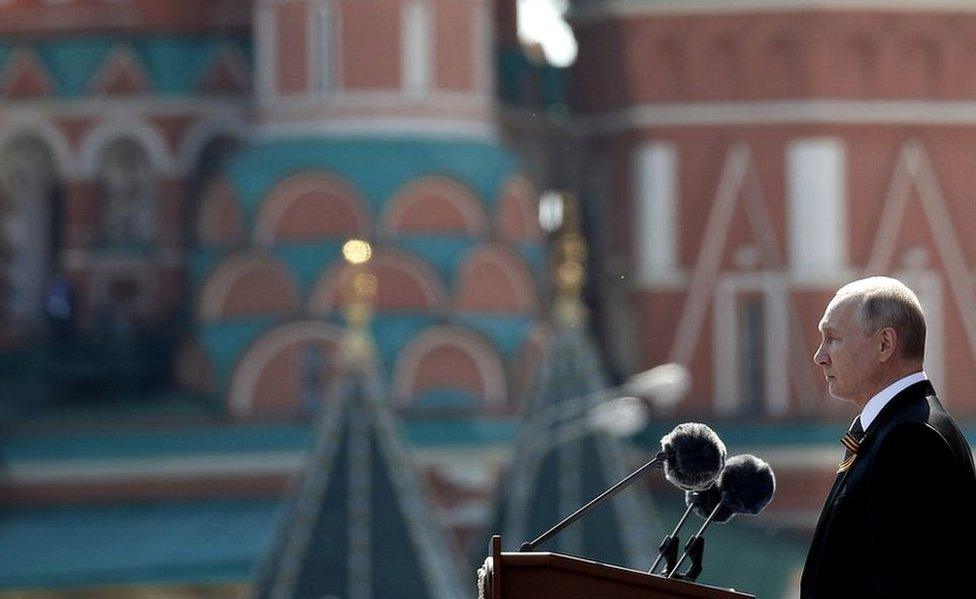 Vladimir Putin (R) delivers a speech during the military parade in the Red Square in Moscow, Russia, 24 June 2020