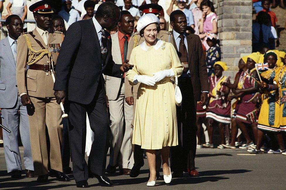 Daniel Toroitich arap Moi, President of Kenya, alongside Queen Elizabeth II following her arrival in Nairobi at the start of her four-day state visit to Kenya, 10 November 1983