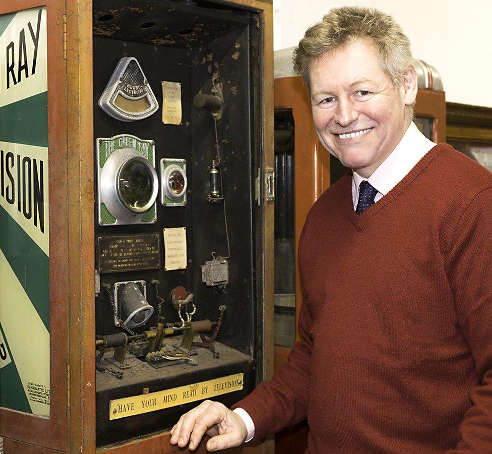 Auctioneer James Laverack and the 'Green Ray Television' machine