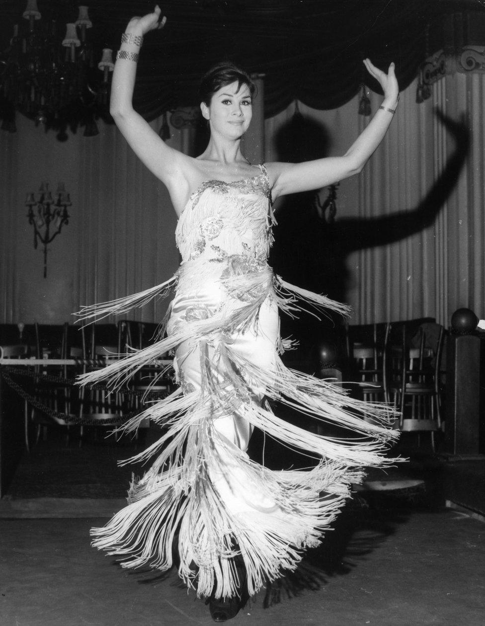 April Ashley during her song and dance act at the Astor Club, London, in 1962