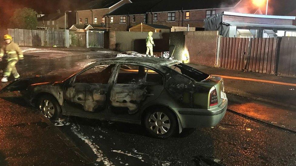 One of the burnt out cars on Etna Drive