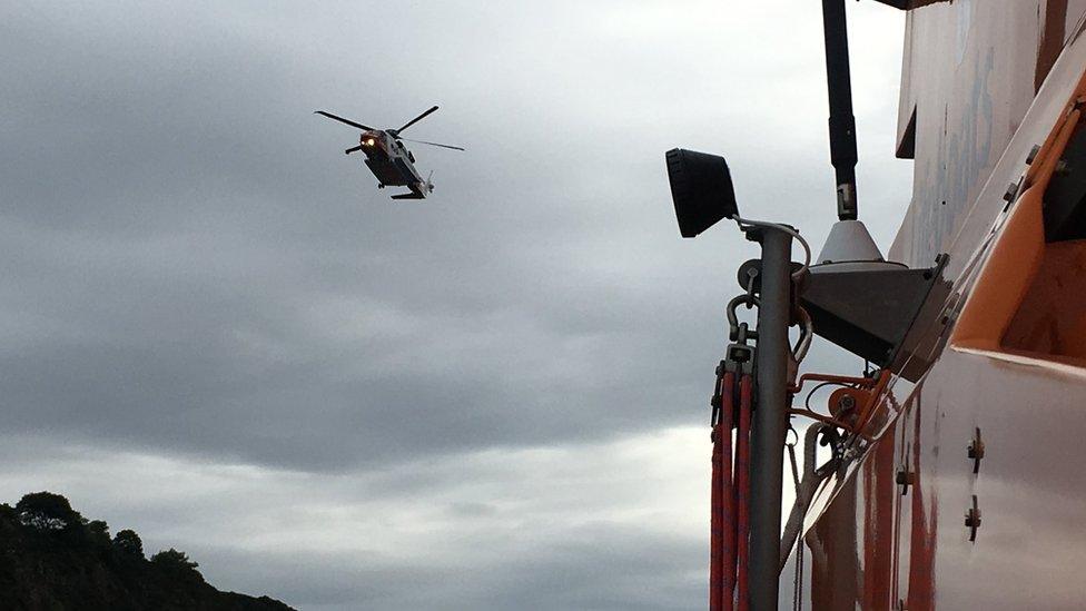 Coastguard helicopter and lifeboat