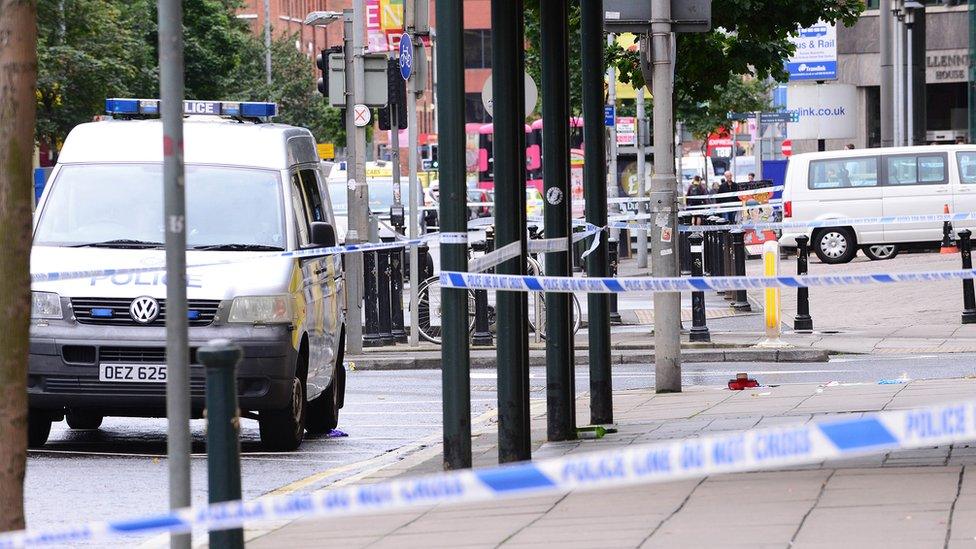 Police vehicles at scene in Belfast city centre