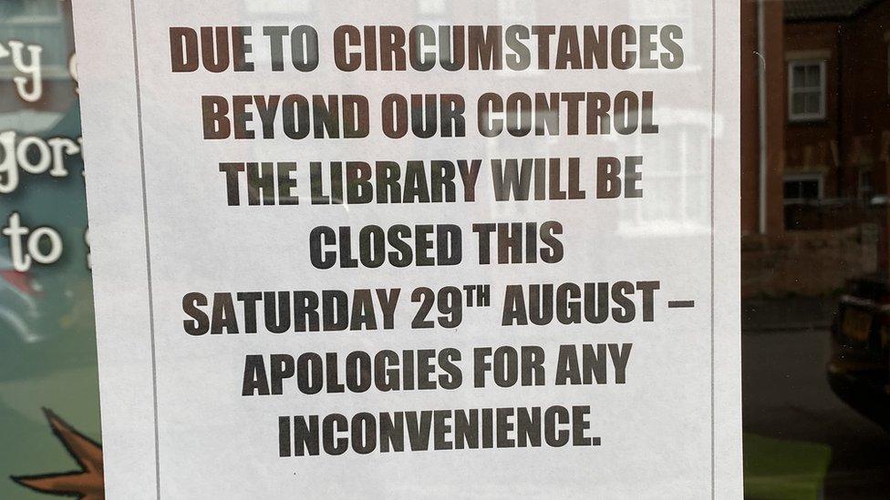 Closed sign at Wollaston Community Library