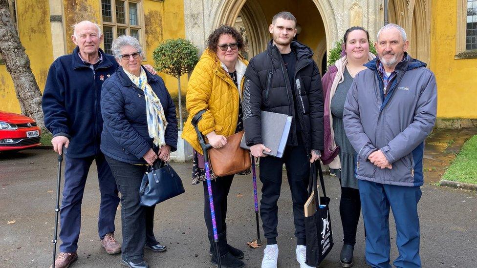 Mr Mitchell's parents, Michael and Sue, wife Tessa, children Joshua and Jessica, and father-in-law David Free