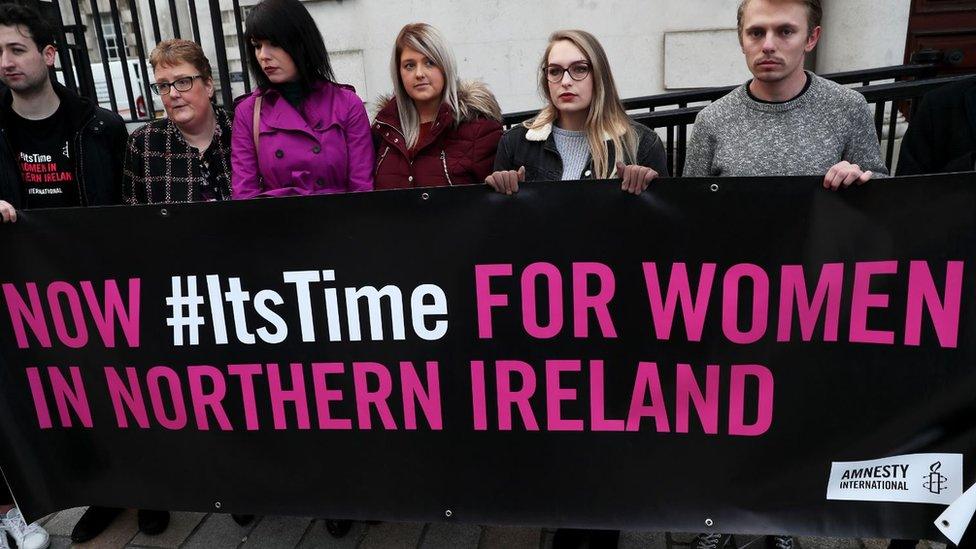 Sarah Ewart (third right) arrives with her mother Jane Christie (second left) and Grainne Teggart (third left) of Amnesty International at Belfast's High Court