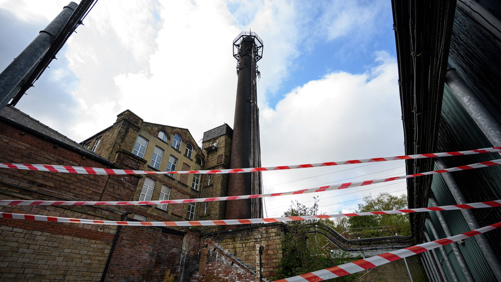 Burnt-out telephone mast in Huddersfield UK