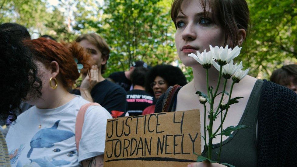 People attend a vigil at City Hall Park for Jordan Neely, who was fatally choked on a subway by a fellow passenger ten days ago, on May 11, 2023 in New York City