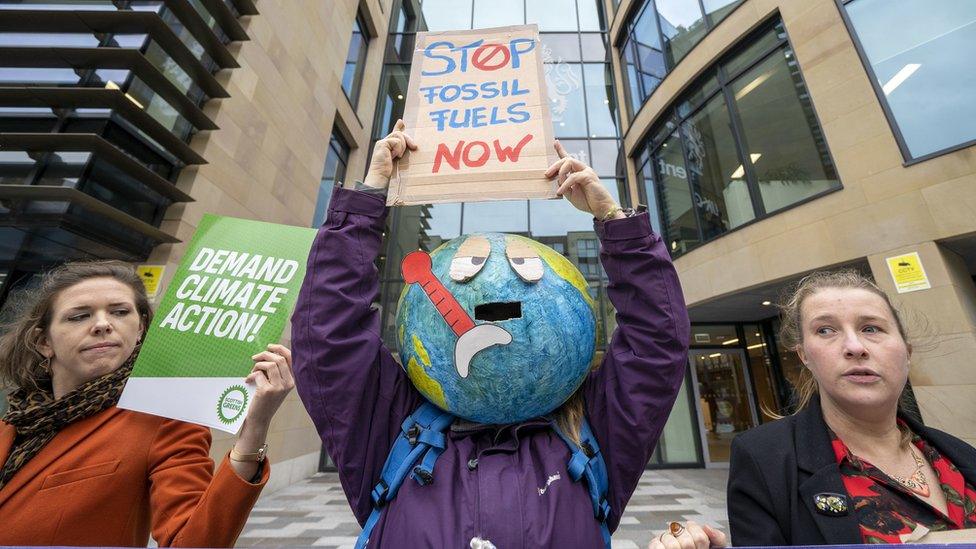 'Stop Rosebank' campaigners outside a government building in Edinburgh