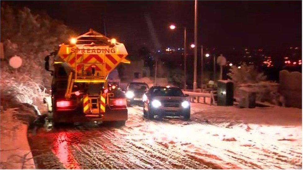 Gritter spreading salt on roads