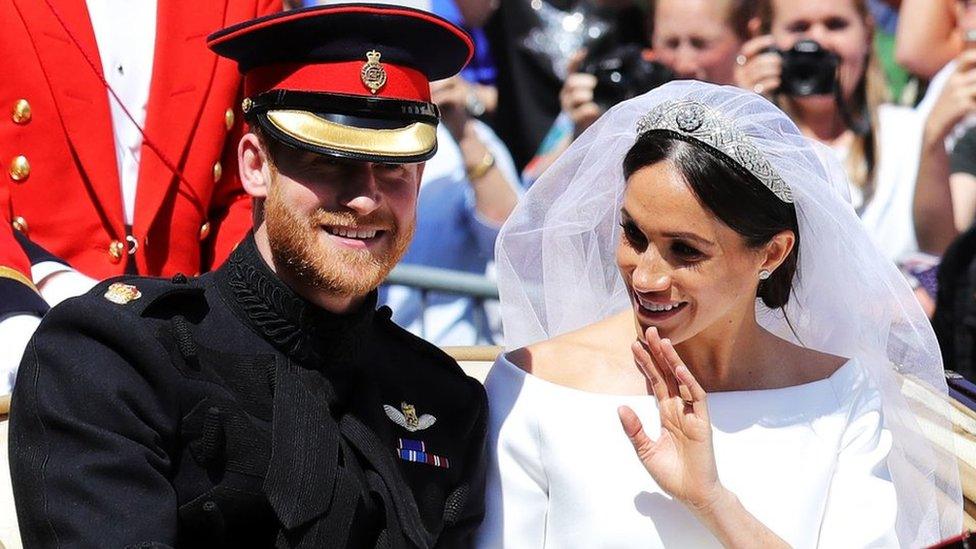 Prince Harry, Duke of Sussex and the Duchess of Sussex in the Ascot Landau carriage during the procession after getting married