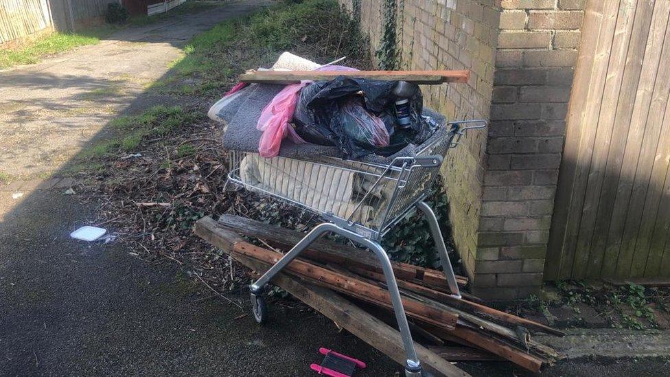 A trolley full of rubbish