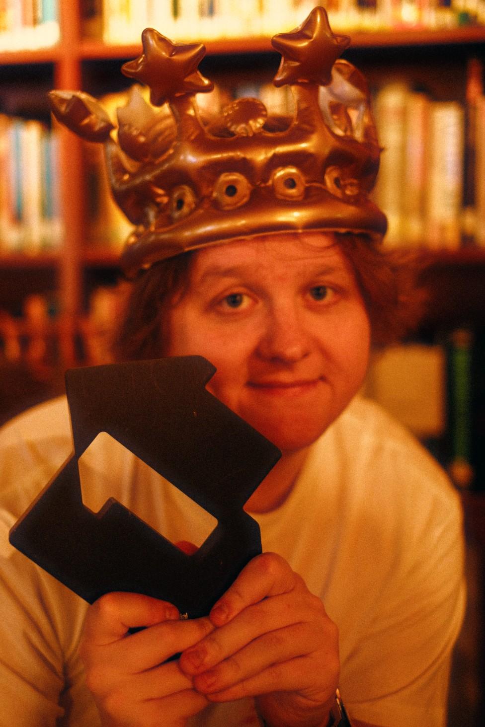 Lewis Capaldi in a crown