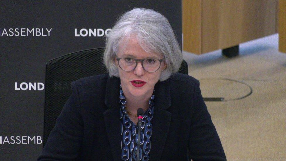 Deputy mayor Sophie Linden speaking to the committee in front of a black background