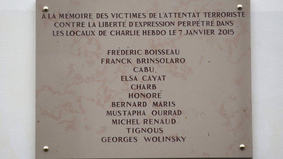 The plaque unveiled outside Charlie Hebdo's offices