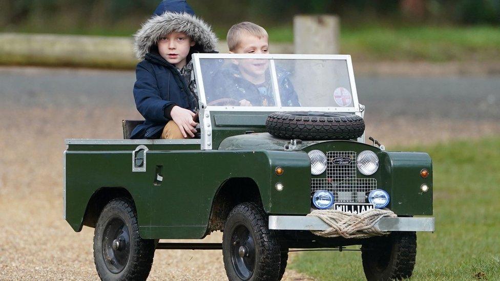 William and Oliver in their motorised toy car at Sandringham, Norfolk