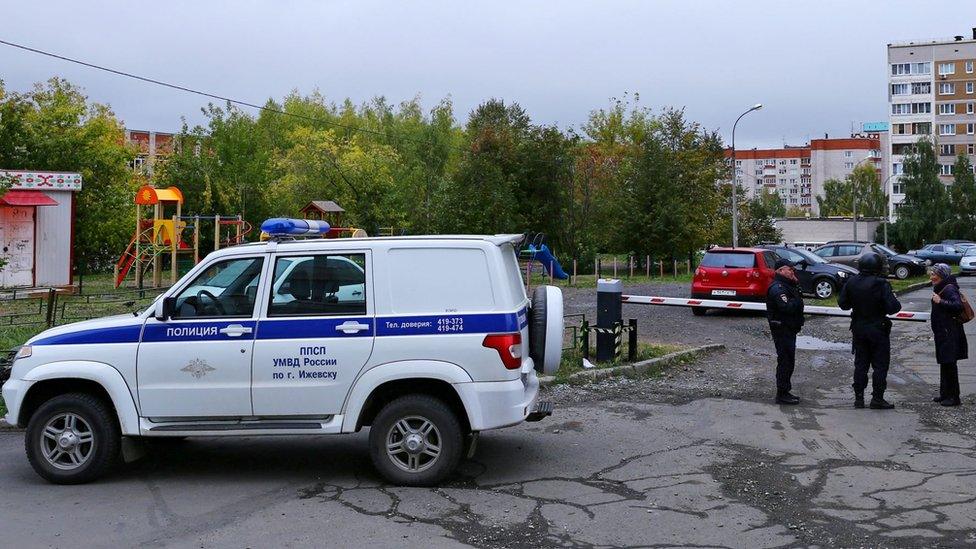 Security service vehicle outside school