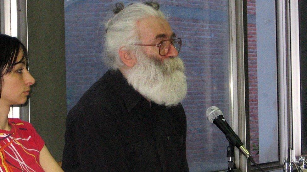 A bearded Radovan Karadzic in a photo released at the time of his arrest in 2008