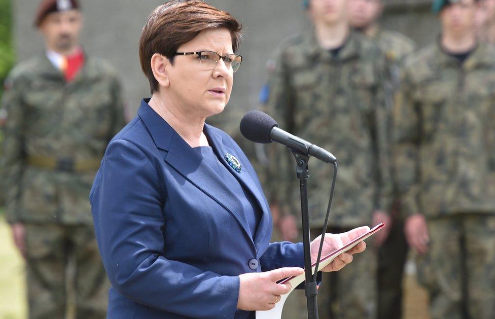 Polish Prime Minister Beata Szydlo speaks next to the Lagerhaus building near the former Nazi-German Concentration camp Auschwitz I in Oswiecim, Poland (14 June 2017)