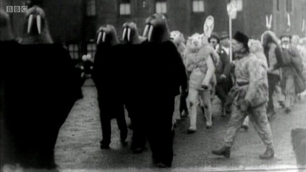 People dressed up as wlaruses at Up Helly Aa