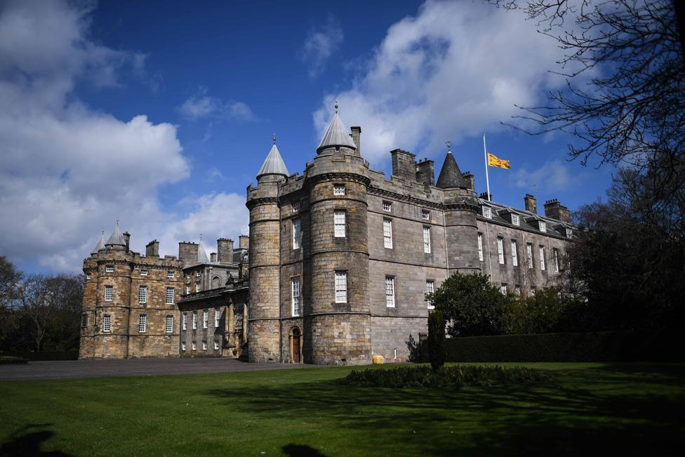 Flag at half mast atop Holyroodhouse in Edinburgh