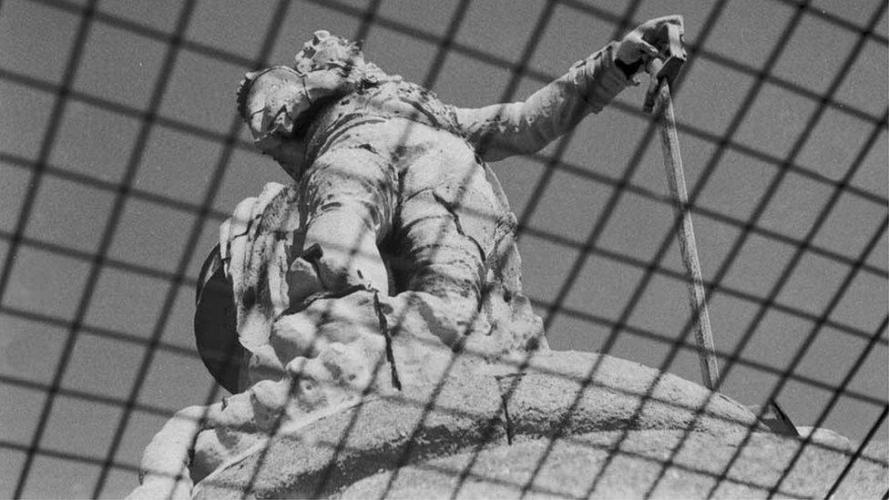 Nelson before the fall and through the mesh/cage that was added in the 1950s after a/some suicide(s).