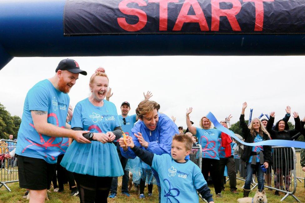 Alzheimer's Society Ambassador Vicky McClure cut the ribbon with a local family to start the Memory Walk at Wollaton Park, in Nottingham, in 2021