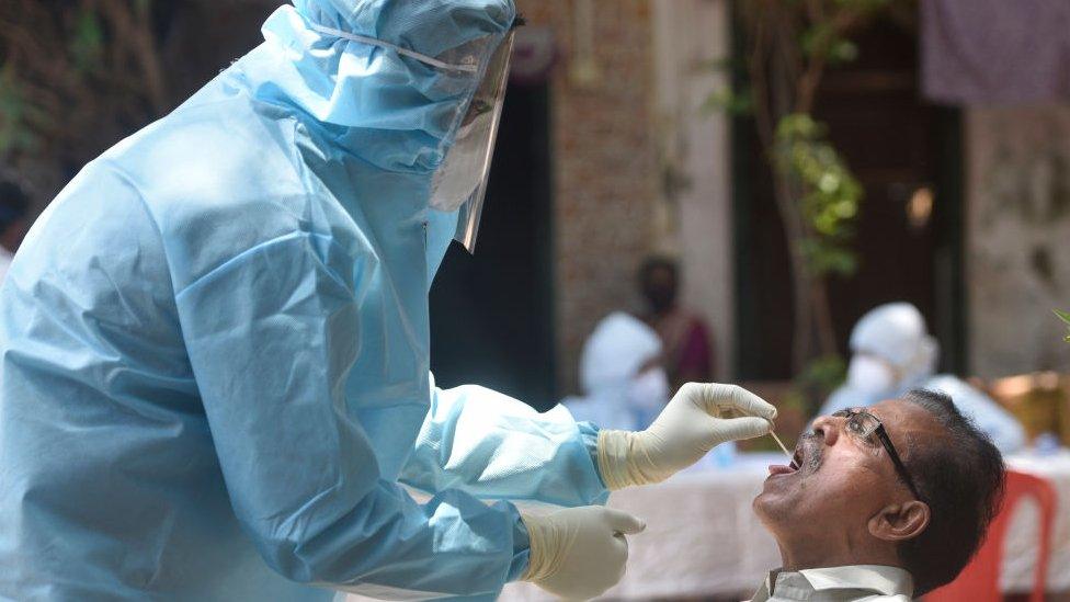 Health workers conducting COVID-19 coronavirus testing drive at Dharavi Slum, during a government-imposed nationwide lockdown as a preventive measure against the spread of the coronavirus, on June 10, 2020