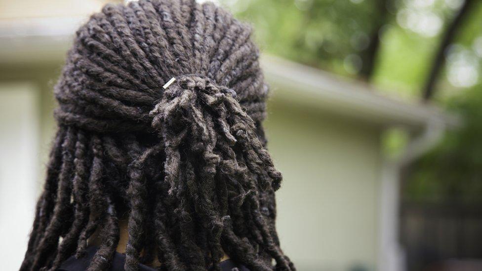 A person with dreadlocks