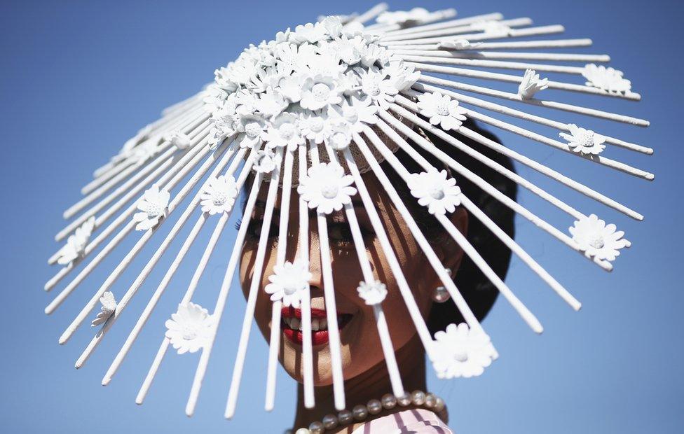 Subtle sun protection: The possible tan lines from this stunning headpiece could prove hazardous