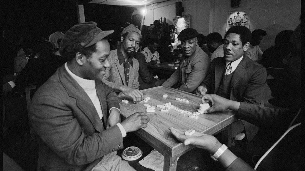 Men playing dominoes at Leeds West Indian Centre