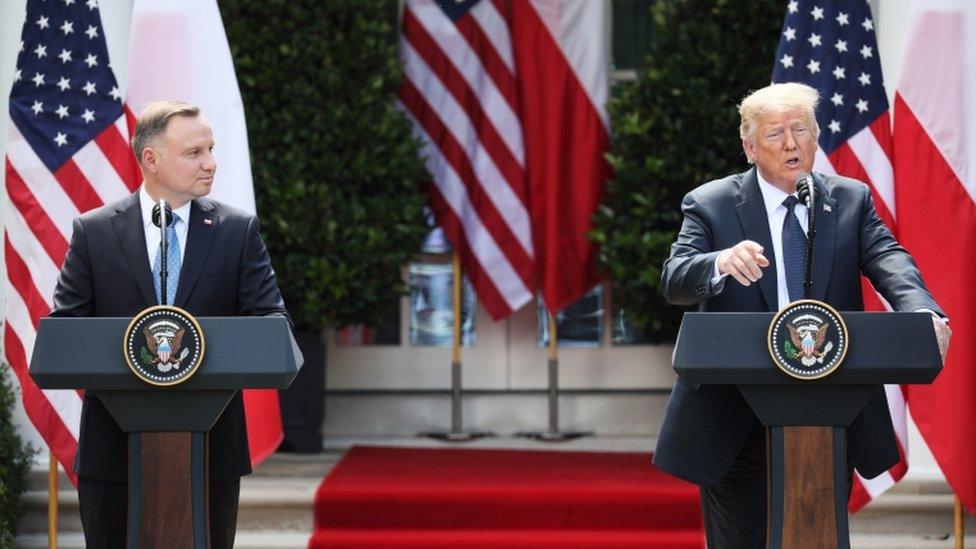 Donald J. Trump (R) and Polish President Andrzej Duda (L) hold a joint press conference in the Rose Garden of the White House in Washington, DC