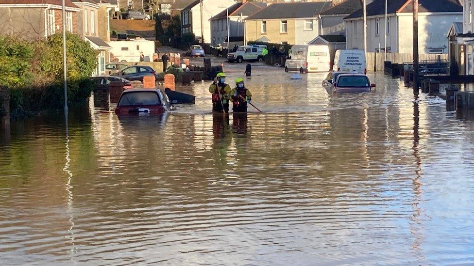 Firefighters in Skewen helped evacuate 80 people from their homes