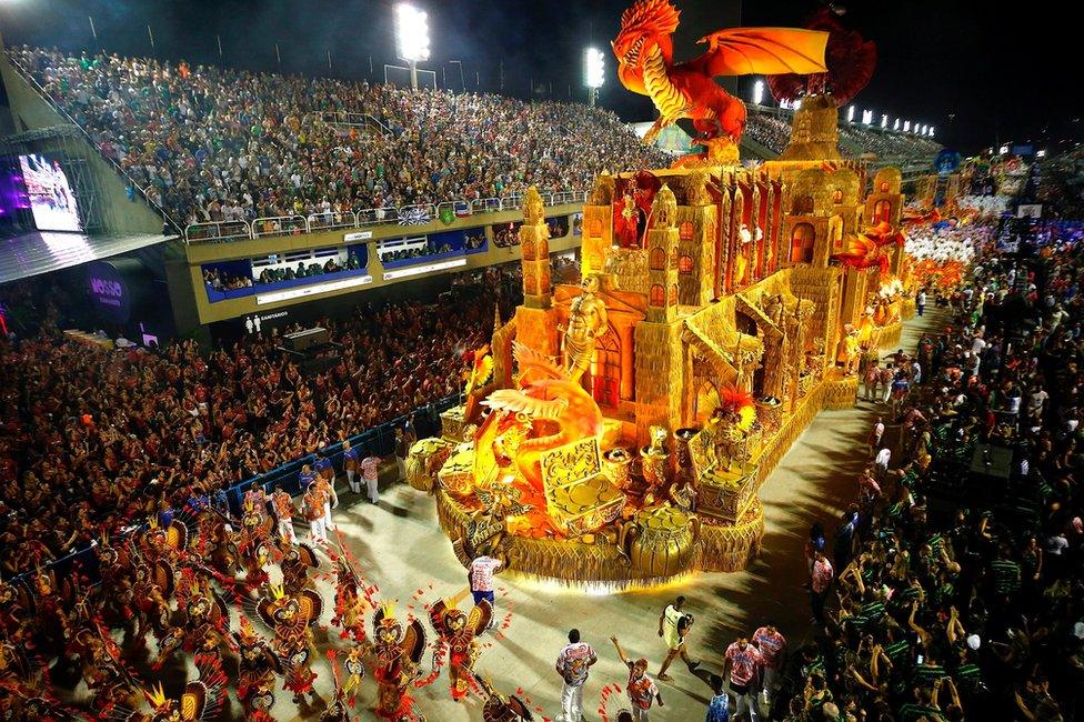 Members of the samba school of the Grupo Especial Paraiso do Tuiuti take part in the traditional carnival parade at Marques de Sapucai sambadrome in Rio de Janeiro, Brazil, early 05 March 2019