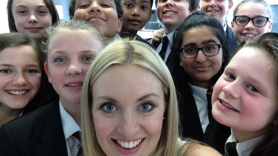 Hayley with school pupils