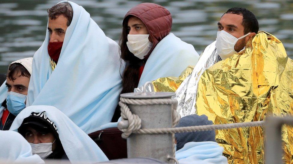 Migrants are brought into Dover, Kent, on a boat