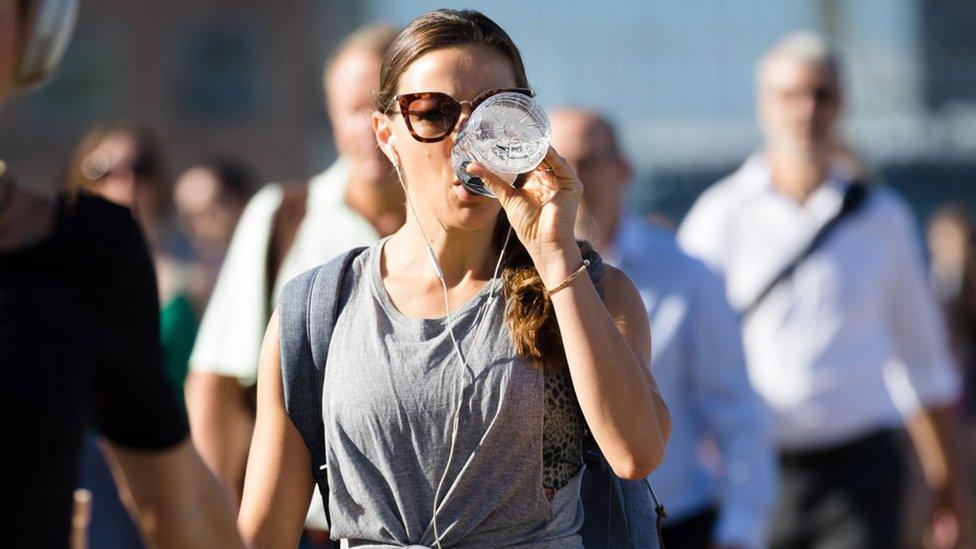 Woman drinks water