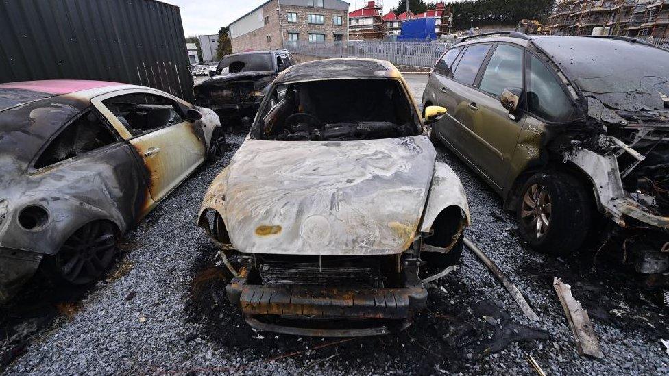 Damaged cars at the scene of a fire in Newtownards