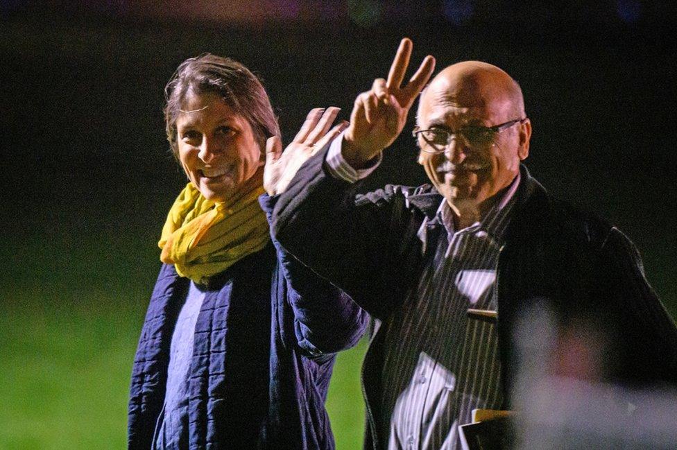 Nazanin Zaghari-Ratcliffe and Anoosheh Ashoori, who were freed from Iran, wave after landing at RAF Brize Norton in England.