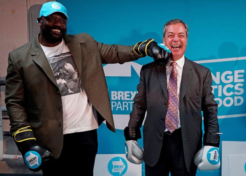 Nigel Farage poses with British boxer Dereck Chisora